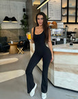 Flex Cut-Out Flared Jumpsuit in Black