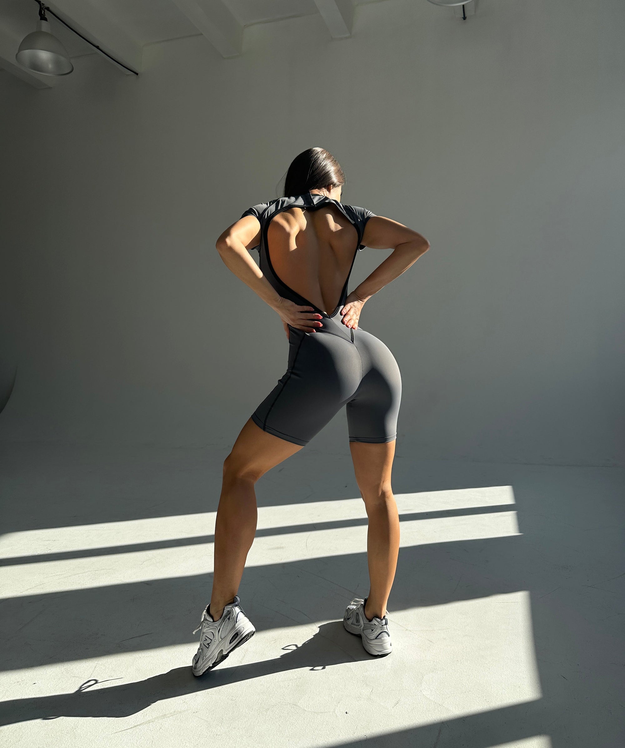 Elabria Contour Seam Open Back Short Sleeve Jumpsuit in Gray