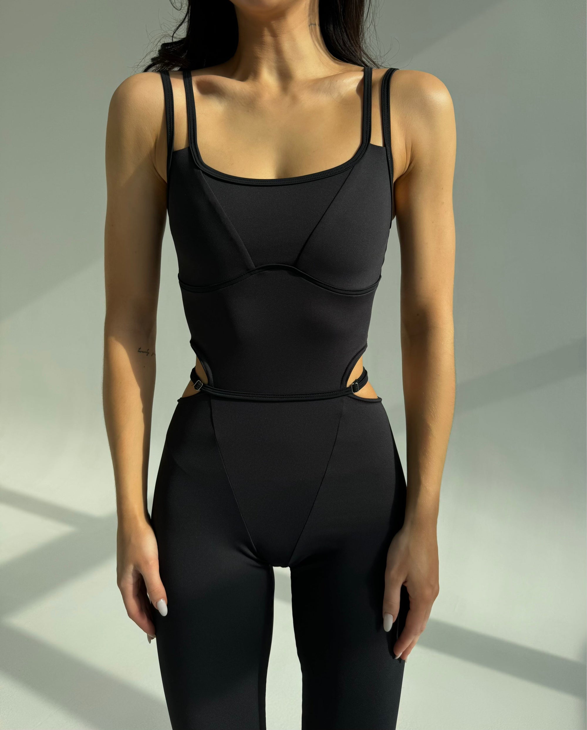 Elabria Strappy Contour Cut Out Unitard Jumpsuit in Black