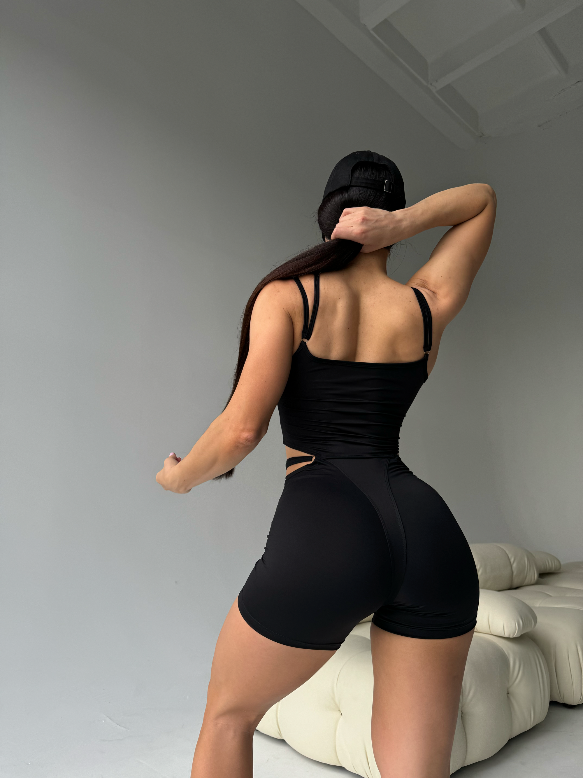 Elabria Strappy Contour Cut Out Unitard Jumpsuit in Black