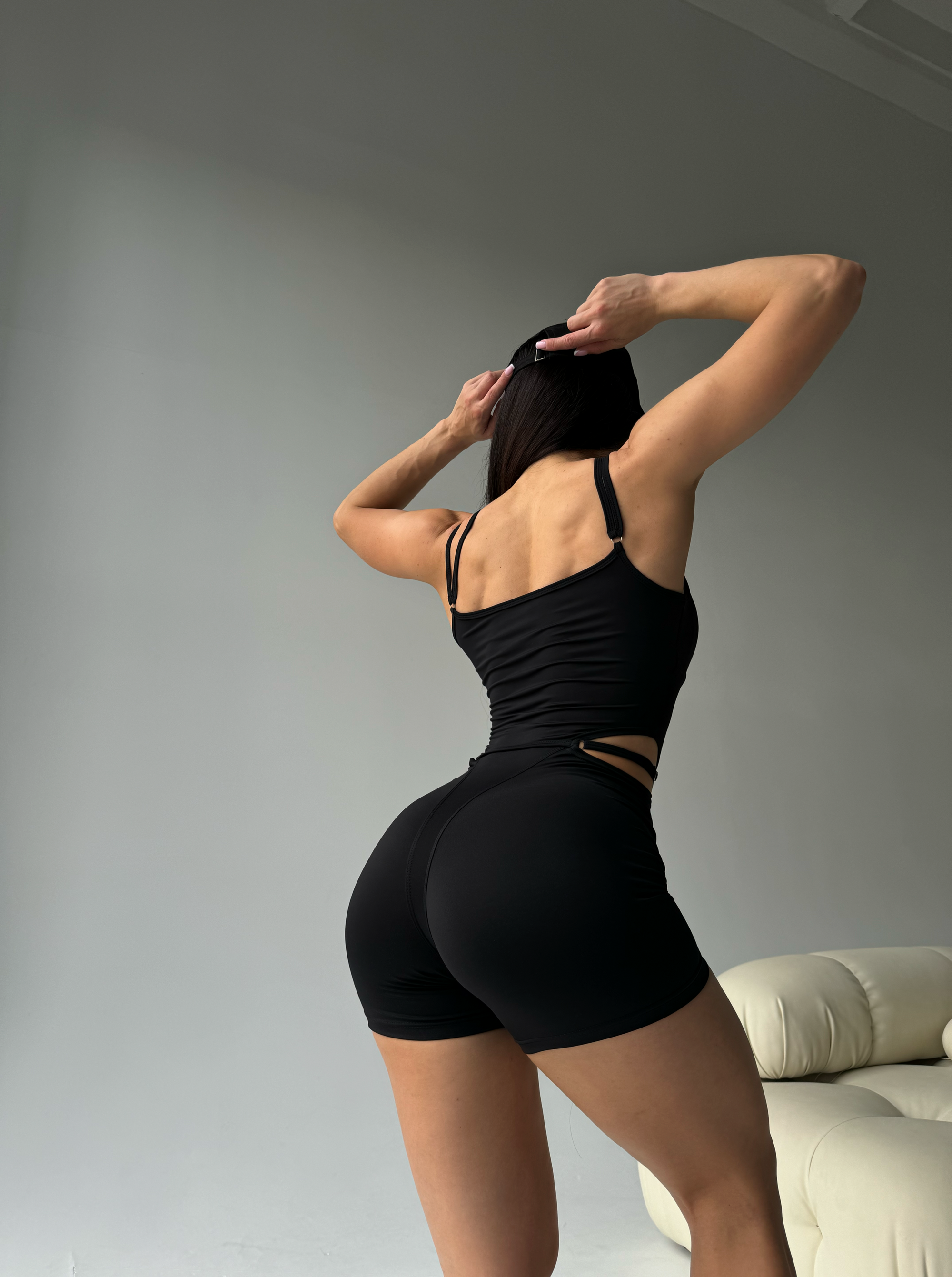 Elabria Strappy Contour Cut Out Unitard Jumpsuit in Black